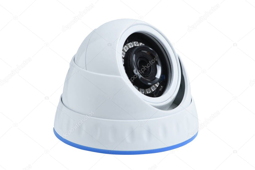 Close-up of a security camera overlooking a building entrance
