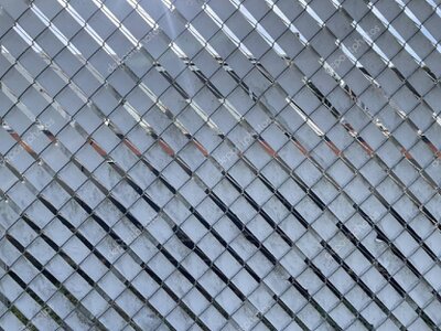 Perimeter fence with security cameras and detection sensors